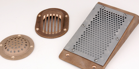 Strainers and scuppers for boats